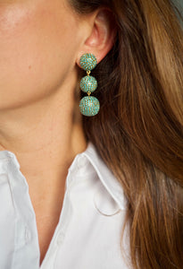 The Pave Lantern Earrings exude classic and timeless design and elegance. Made in the shape of a triple drop lanterns and hand wrapped with dazzling mini blue stones by talented artisans.