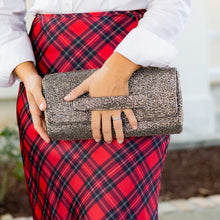 Load image into Gallery viewer, Person wearing a white shirt and red plaid skirt holding a gray beaded clutch.
